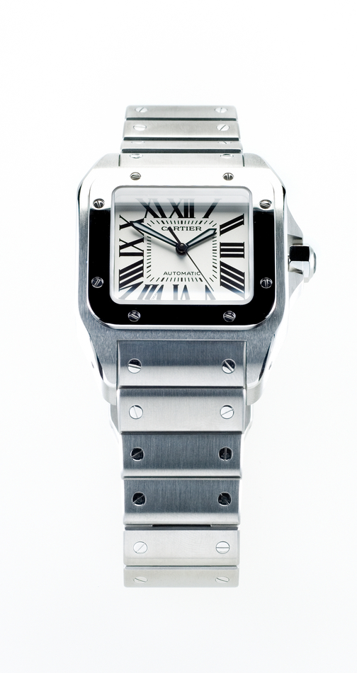 Leiden, The Netherlands - October 11, 2007: Product shot of a Cartier Santos Steel Automatic wristwatch on white background. This watch has a polished stainless steel case, a steel strap and an automatic movement.